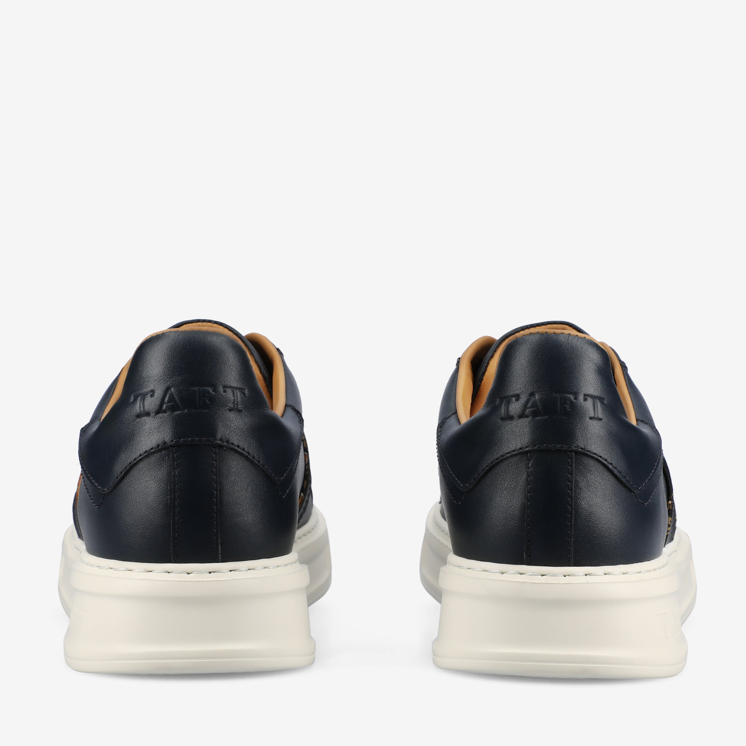 The Logan Sneaker in Navy